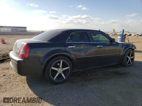2006 Chrysler 300 C with VIN 2C3KA63H06H272552, listed as a Copart auction lot 72185684 with 105,737 mi miles and Salvage Title. Bid and sale history available at carsss.com. Image 3.