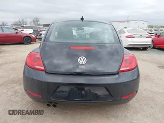 2013 Volkswagen Beetle 2.5L with VIN 3VWJP7AT8DM679548, listed as a IAAI auction lot 41459613 with 135,198 mi miles and . Bid and sale history available at DreamBid. Image 16.