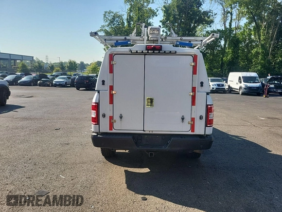 2018 Ford F-150 XL with VIN 1FTNF1E52JKE87531, listed as a IAAI auction lot 42740984 with 121,670 mi miles and . Bid and sale history available at DreamBid. Image 8.