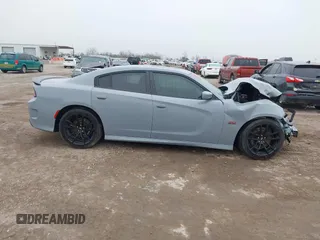 2020 Dodge Charger Scat Pack Widebody z VIN 2C3CDXGJ8LH216563, wystawiony jako IAAI lot #41502637 z przebiegiem Nie podano mil oraz . Historia ofert i sprzedaży dostępna na DreamBid. Obrazek 13.