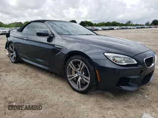 2016 BMW M6 z VIN WBS6G9C58GD931908, wystawiony jako Copart lot #72067214 z przebiegiem 84 170 mil mil oraz Szkody całkowita. Historia ofert i sprzedaży dostępna na DreamBid. Obrazek 4.