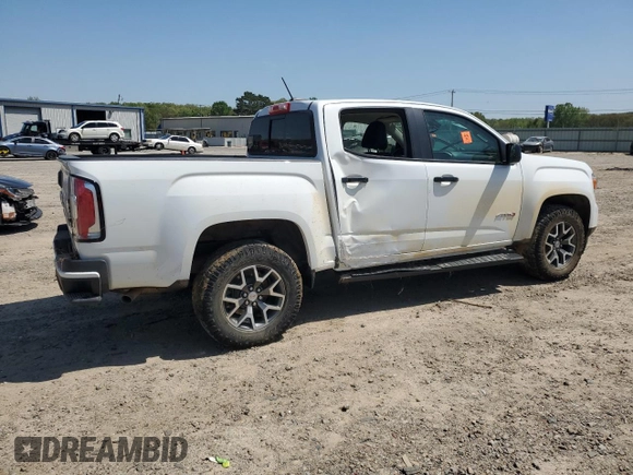 2021 GMC Canyon 4WD AT4 z VIN 1GTG6FEN5M1118081, wystawiony jako Copart lot #52452785 z przebiegiem 92 960 mil mil oraz Szkody całkowita. Historia ofert i sprzedaży dostępna na DreamBid. Obrazek 3.