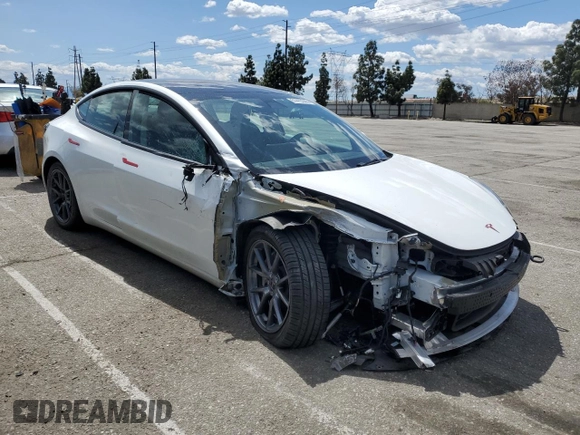 2022 Tesla Model 3 Long Range with VIN 5YJ3E1EB4NF139023, listed as a Copart auction lot 51410345 with 54,789 mi miles and Salvage Title. Bid and sale history available at DreamBid. Image 4.