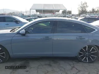 2023 Honda Accord Touring with VIN 1HGCY2F81PA035053, listed as a IAAI auction lot 41807628 with 57,422 mi miles and . Bid and sale history available at DreamBid. Image 14.