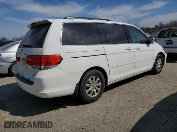 2010 Honda Odyssey EX-L with VIN 5FNRL3H77AB051869, listed as a Copart auction lot 48473815 with 248,511 mi miles and Salvage Title. Bid and sale history available at DreamBid. Image 3.