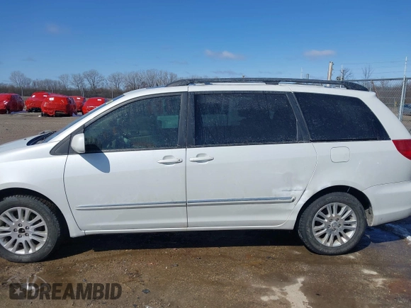 2008 Toyota Sienna XLE with VIN 5TDZK22C18S174818, listed as a IAAI auction lot 41906039 with 249,182 mi miles. Bid and sale history available at carsss.com. Image 14.