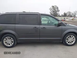 2016 Dodge Grand Caravan SXT with VIN 2C4RDGCG0GR262887, listed as a IAAI auction lot 42097766 with 55,491 mi miles and . Bid and sale history available at DreamBid. Image 13.