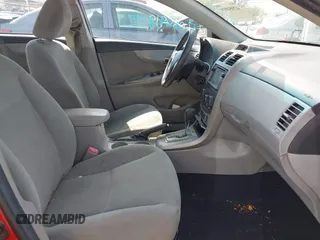 2013 Toyota Corolla L with VIN 5YFBU4EE2DP152852, listed as a IAAI auction lot 42084919 with 243,636 mi miles. Bid and sale history available at carsss.com. Image 5.