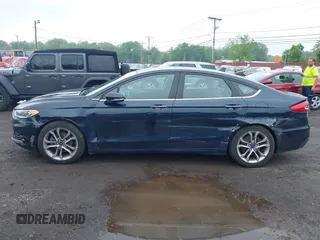 2020 Ford Fusion SEL z VIN 3FA6P0CD9LR183400, wystawiony jako IAAI lot #42271491 z przebiegiem 52 020 mil mil oraz . Historia ofert i sprzedaży dostępna na DreamBid. Obrazek 14.