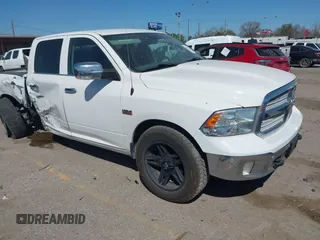 2018 Ram 1500 Lone Star Silver z VIN 1C6RR6LT0JS245223, wystawiony jako IAAI lot #41765175 z przebiegiem 128 156 mil mil oraz . Historia ofert i sprzedaży dostępna na DreamBid. Obrazek 1.