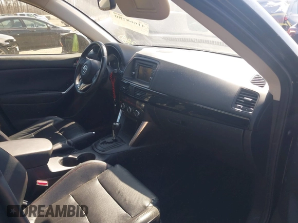 2014 Mazda CX-5 Grand Touring with VIN JM3KE4DY1E0339690, listed as a IAAI auction lot 41668780 with 216,825 mi miles. Bid and sale history available at carsss.com. Image 5.