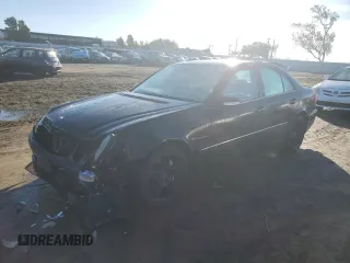 2003 Mercedes-Benz E-Class 5.5L AMG with VIN WDBUF76J73A364731, listed as a Copart auction lot 87019114 with 187,696 mi miles and Salvage Title. Bid and sale history available at carsss.com. Image 1.