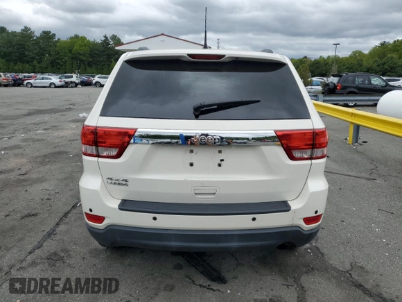 2011 Jeep Grand Cherokee Laredo with VIN 1J4RR4GG9BC515467, listed as a Copart auction lot 58411085 with 112,558 mi miles and Salvage title. Bid and sale history available at DreamBid. Image 6.