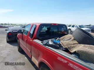 2001 Ford F-150 XL with VIN 1FTRX18L91NB88500, listed as a IAAI auction lot 42096189 with Not provided miles and . Bid and sale history available at DreamBid. Image 6.
