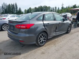 2015 Ford Focus SE with VIN 1FADP3F20FL269846, listed as a IAAI auction lot 42507197 with 143,496 mi miles and . Bid and sale history available at DreamBid. Image 4.