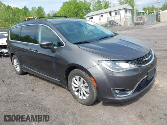 2017 Chrysler Pacifica Touring L with VIN 2C4RC1BG5HR705277, listed as a IAAI auction lot 42230036 with 75,287 mi miles and . Bid and sale history available at DreamBid. Image 1.