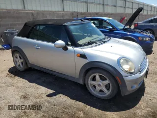 2010 MINI Convertible with VIN WMWMR3C5XATU98379, listed as a Copart auction lot 56360255 with 108,414 mi miles and Clean Title. Bid and sale history available at DreamBid. Image 4.