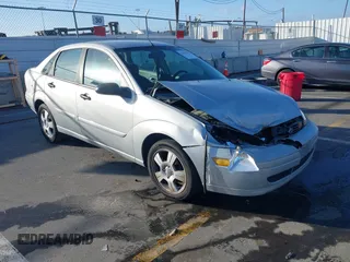2003 Ford Focus SE z VIN 1FAFP34Z13W212283, wystawiony jako IAAI lot #41594302 z przebiegiem 168 408 mil mil oraz . Historia ofert i sprzedaży dostępna na DreamBid. Obrazek 1.