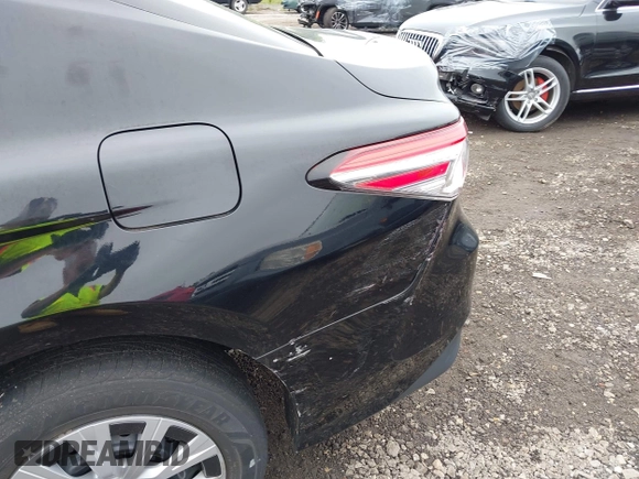 2019 Toyota Camry Hybrid LE z VIN 4T1B31HK5KU510055, wystawiony jako IAAI lot #42325522 z przebiegiem 97 000 mil mil oraz . Historia ofert i sprzedaży dostępna na DreamBid. Obrazek 19.