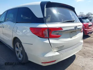 2018 Honda Odyssey EX-L z VIN 5FNRL6H70JB102713, wystawiony jako IAAI lot #42003129 z przebiegiem 410 500 mil mil oraz . Historia ofert i sprzedaży dostępna na DreamBid. Obrazek 6.