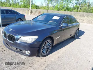 2011 BMW 7 Series 740i with VIN WBAKA4C52BC392112, listed as a IAAI auction lot 41736939 with 125,953 mi miles and . Bid and sale history available at carsss.com. Image 2.
