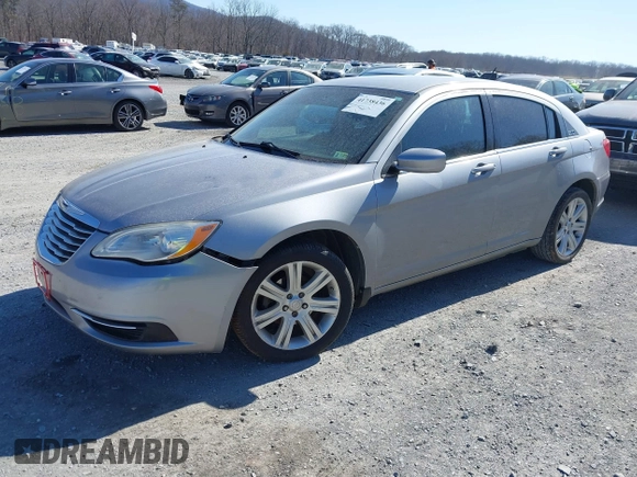 2013 Chrysler 200 Touring with VIN 1C3CCBBB4DN693621, listed as a IAAI auction lot 41738436 with 240,693 mi miles and . Bid and sale history available at DreamBid. Image 2.