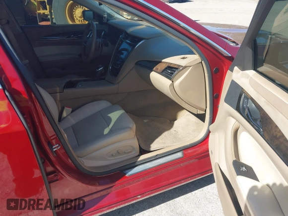 2016 Cadillac CTS Luxury Collection AWD with VIN 1G6AX5SXXG0100952, listed as a IAAI auction lot 41736200 with 123,495 mi miles and . Bid and sale history available at DreamBid. Image 5.