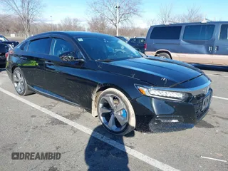 2018 Honda Accord Touring z VIN 1HGCV1F90JA000538, wystawiony jako IAAI lot #41151159 z przebiegiem 171 070 mil mil oraz . Historia ofert i sprzedaży dostępna na DreamBid. Obrazek 1.