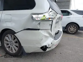 2011 Toyota Sienna XLE AAS with VIN 5TDYK3DC8BS148948, listed as a IAAI auction lot 41806293 with 144,645 mi miles and . Bid and sale history available at DreamBid. Image 6.