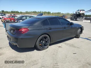 2015 BMW 6 Series 640i xDrive z VIN WBA6B8C53FD453909, wystawiony jako Copart lot #55292765 z przebiegiem 84 971 mil mil oraz Szkoda całkowita • Salvage title. Historia ofert i sprzedaży dostępna na DreamBid. Obrazek 3.