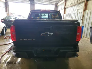 2019 Chevrolet Colorado 4WD Z71 z VIN 1GCGTDEN1K1247266, wystawiony jako Copart lot #56688755 z przebiegiem Nie podano mil oraz Szkoda całkowita • Salvage title. Historia ofert i sprzedaży dostępna na DreamBid. Obrazek 6.
