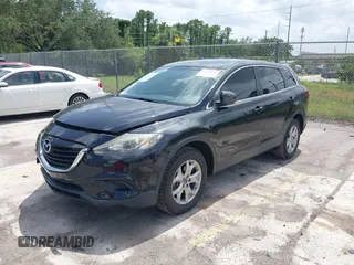 2014 Mazda CX-9 Touring with VIN JM3TB2CA5E0429835, listed as a IAAI auction lot 42439258 with 110,914 mi miles and . Bid and sale history available at DreamBid. Image 2.
