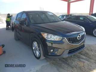 2015 Mazda CX-5 Grand Touring with VIN JM3KE4DY7F0481883, listed as a IAAI auction lot 42091709 with 184,248 mi miles and . Bid and sale history available at DreamBid. Image 1.