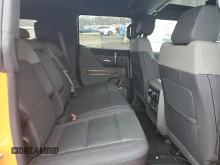 2024 GMC Hummer EV 3X z VIN 1GKB0RDCXRU113305, wystawiony jako Copart lot #52011735 z przebiegiem 5 142 mil mil oraz Szkoda całkowita • Salvage title. Historia ofert i sprzedaży dostępna na DreamBid. Obrazek 11.