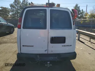 2005 Chevrolet Express Cargo z VIN 1GCFG15X751112877, wystawiony jako Copart lot #77494014 z przebiegiem 349 555 mil mil oraz Czysty tytuł • Clean title. Historia ofert i sprzedaży dostępna na DreamBid. Obrazek 6.