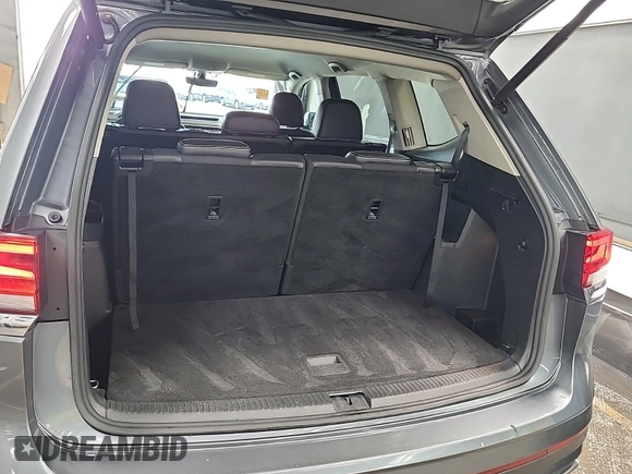 2023 Volkswagen Atlas SE z VIN 1V2HR2CA5PC526012, wystawiony jako IAAI lot #42796408 z przebiegiem 41 216 mil mil oraz . Historia ofert i sprzedaży dostępna na DreamBid. Obrazek 31.