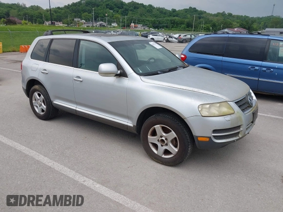 2007 Volkswagen Touareg V6 z VIN WVGZE77L57D001046, wystawiony jako IAAI lot #42283224 z przebiegiem 243 861 mil mil oraz . Historia ofert i sprzedaży dostępna na DreamBid. Obrazek 1.