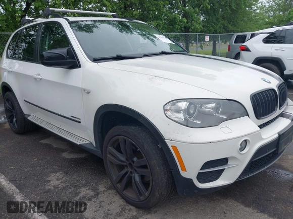 2012 BMW X5 35i с VIN 5UXZV4C5XCL765368, выставлен на аукционе IAAI как лот 42526136 с пробегом 165 365 миль миль и . История ставок и продаж доступна на DreamBid. Изображение 1.