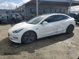 2019 Tesla Model 3 Mid Range z VIN 5YJ3E1EA0KF464612, wystawiony jako Copart lot #42177035 z przebiegiem 63 406 mil mil oraz Szkody całkowita. Historia ofert i sprzedaży dostępna na DreamBid. Obrazek 1.
