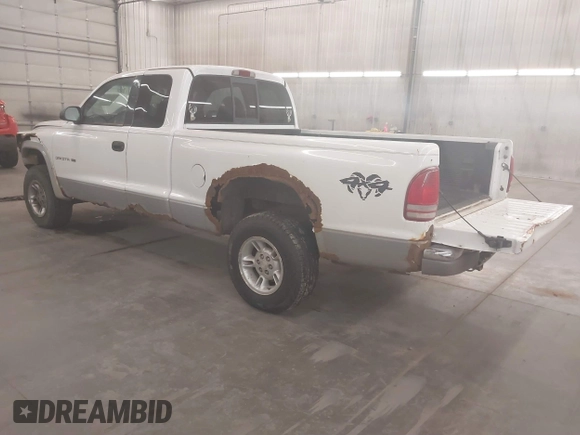 1999 Dodge Dakota SLT with VIN 1B7GG22XXXS254782, listed as a IAAI auction lot 41847644 with 164,607 mi miles and . Bid and sale history available at carsss.com. Image 3.