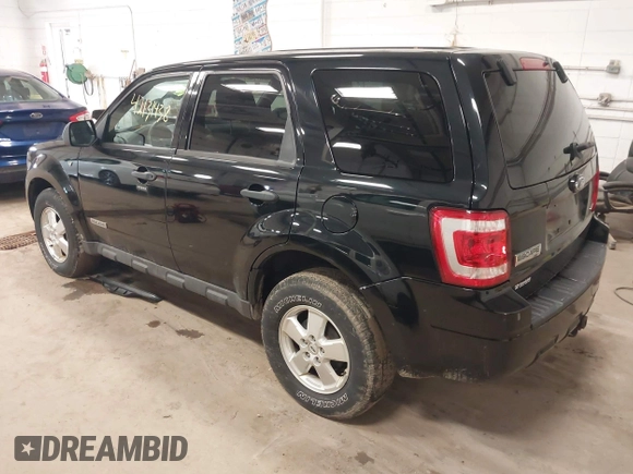 2008 Ford Escape XLT with VIN 1FMCU93108KA04863, listed as a IAAI auction lot 42131438 with 126,439 mi miles. Bid and sale history available at carsss.com. Image 3.