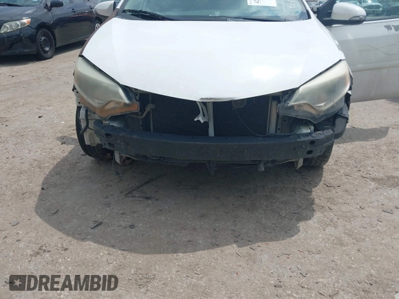 2016 Toyota Corolla L with VIN 5YFBURHE4GP401469, listed as a IAAI auction lot 42083642 with 204,258 mi miles and . Bid and sale history available at DreamBid. Image 6.