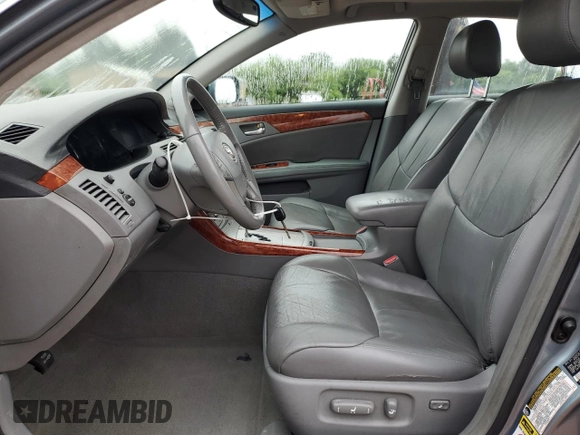 2005 Toyota Avalon XL z VIN 4T1BK36B65U041287, wystawiony jako Copart lot #56566535 z przebiegiem 223 562 mil mil oraz Szkoda całkowita • Salvage title. Historia ofert i sprzedaży dostępna na DreamBid. Obrazek 7.