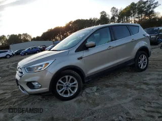 2017 Ford Escape SE with VIN 1FMCU0GD8HUD73233, listed as a Copart auction lot 80984074 with 68,989 mi miles and Salvage Title. Bid and sale history available at carsss.com. Image 1.