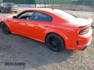 2022 Dodge Charger Scat Pack Widebody with VIN 2C3CDXGJ3NH101081, listed as a IAAI auction lot 41351466 with 9,575 mi miles and . Bid and sale history available at DreamBid. Image 3.