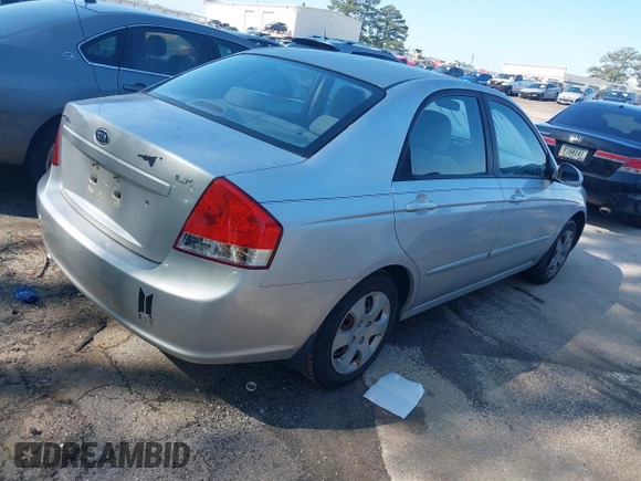 2009 Kia Spectra EX with VIN KNAFE221695647240, listed as a IAAI auction lot 41994191 with 237,101 mi miles. Bid and sale history available at carsss.com. Image 4.