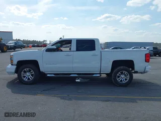 2015 Chevrolet Silverado 1500 LT with VIN 3GCUKREC9FG190338, listed as a IAAI auction lot 41793915 with 116,558 mi miles. Bid and sale history available at carsss.com. Image 14.