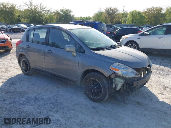 2012 Nissan Versa S with VIN 3N1BC1CP8CK242212, listed as a IAAI auction lot 42027327 with 117,118 mi miles. Bid and sale history available at carsss.com. Image 1.