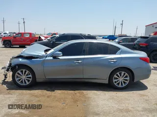 2015 Infiniti Q50 z VIN JN1BV7AP2FM357716, wystawiony jako IAAI lot #42504273 z przebiegiem 74 608 mil mil oraz . Historia ofert i sprzedaży dostępna na DreamBid. Obrazek 15.