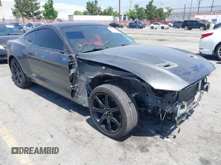 2020 Ford Mustang EcoBoost with VIN 1FA6P8THXL5163452, listed as a IAAI auction lot 42524697 with 91,105 mi miles and . Bid and sale history available at DreamBid. Image 1.